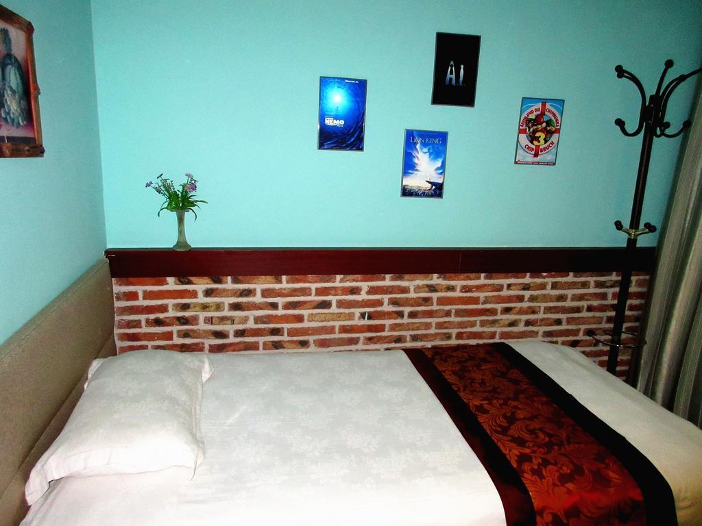 25°C Four Season Youth Hostel Qingdao Ruang foto