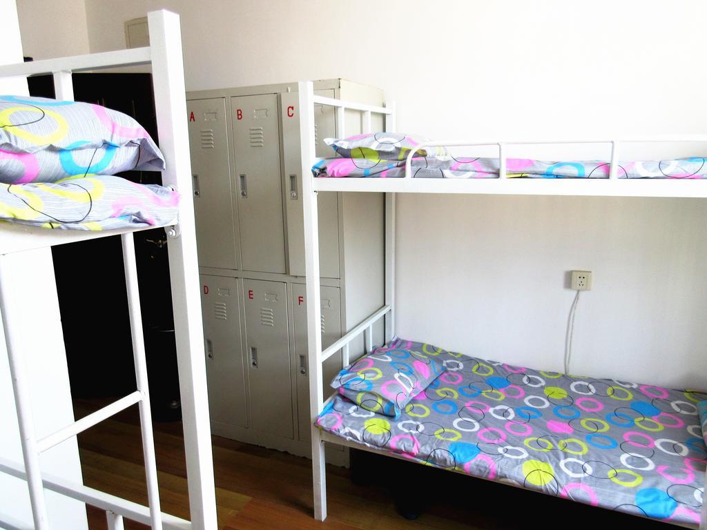 25°C Four Season Youth Hostel Qingdao Ruang foto