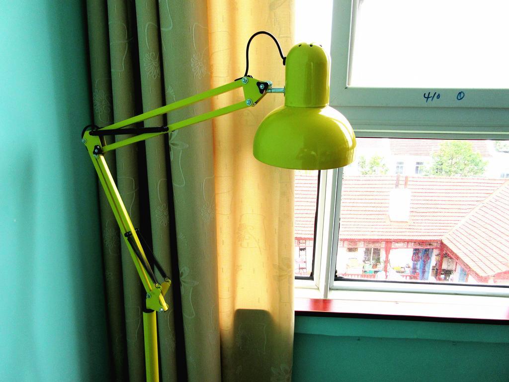 25°C Four Season Youth Hostel Qingdao Ruang foto